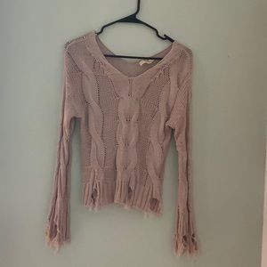 Pink crocheted sweater